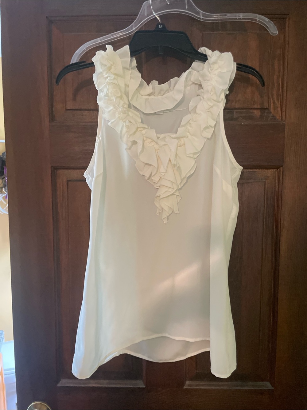 New York & Company 
Cream Ruffle V-Neck 
Sleeveless Blouse